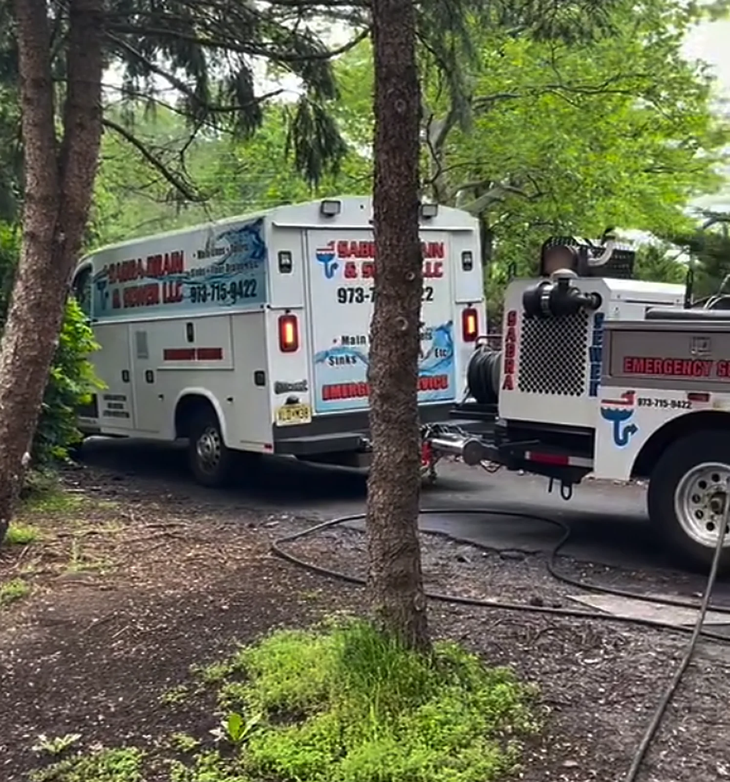 Sabra Drain & Sewer trucks and hydro-jetter on a job